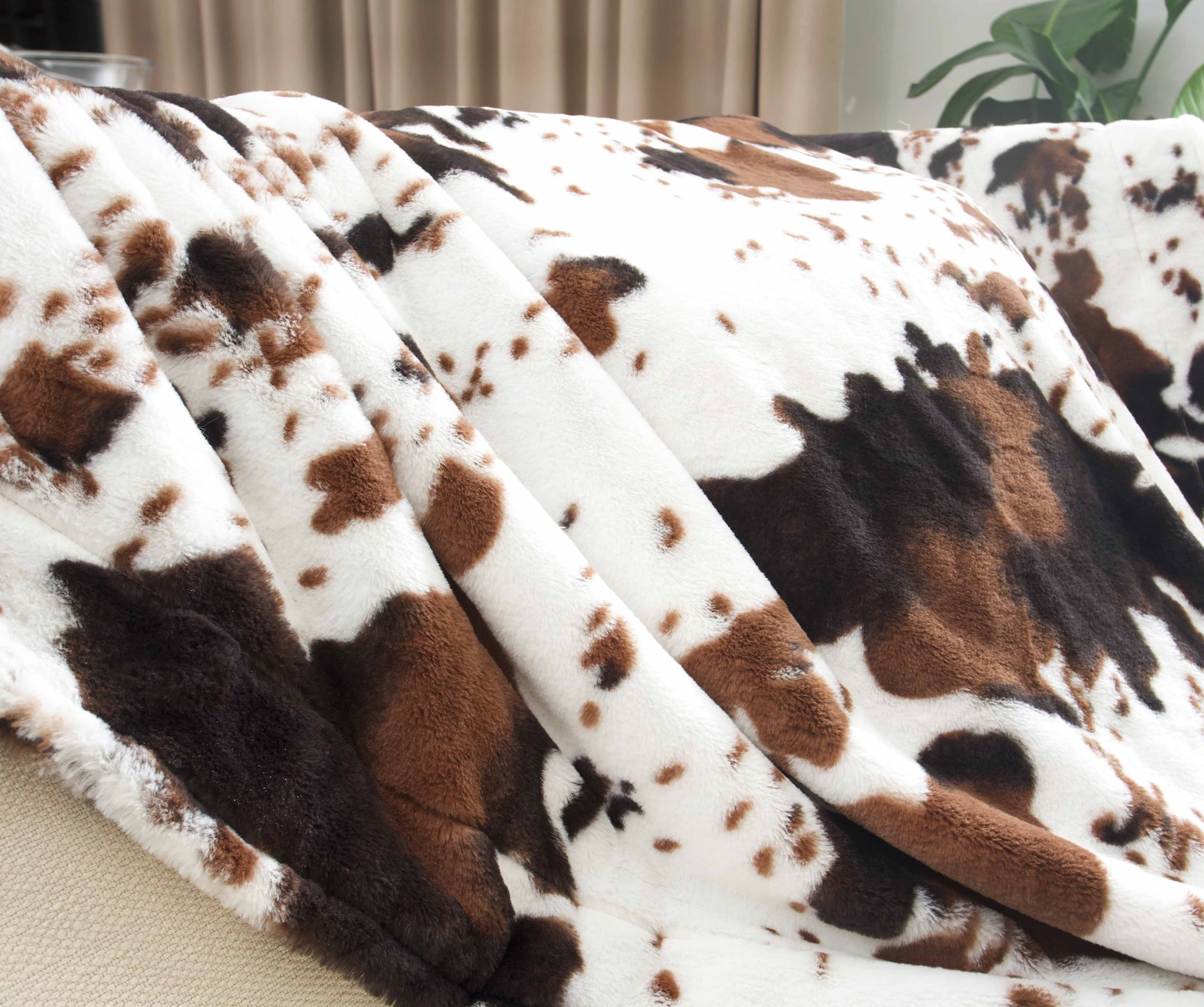 Faux cowhide 2025 throw blanket